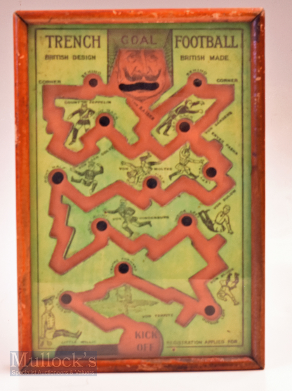 WWI Trench football game made 1915 - Green and on laid orange card boards with cut-out game design