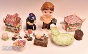 A collection of golf collectables ceramic and resin, to include teapots mugs ashtray salt and pepper