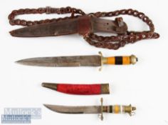 2x Sikh Indian Dress Kirpan Knives one having wooden and amber coloured banded handle with brass