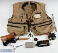 Orvis Fly Vest XL with 7 external pockets and 5 internal pockets, 1 large back pocket, loaded with