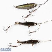 Early white glass eye gutta percha Caledonia style baits features 2 ¾" examples with gilt blades and