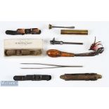 Collection of early handheld fly tying vices, oiler, tweezer, and 'Adaptacast' reel fittings (8) -
