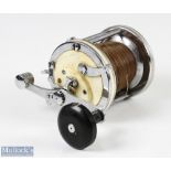 Garcia Mitchell 624 sea multiplier reel - Chrome and cream, power crank handle with star drag, level