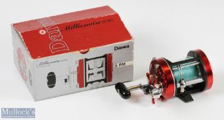 Daiwa Millionaire 6RM multiplier reel in red finish, star drag, counter balance handle, signs of