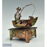 Metal work Fishing Musical ornament depicts a pivoting fisherman in boat with Sankyo musical