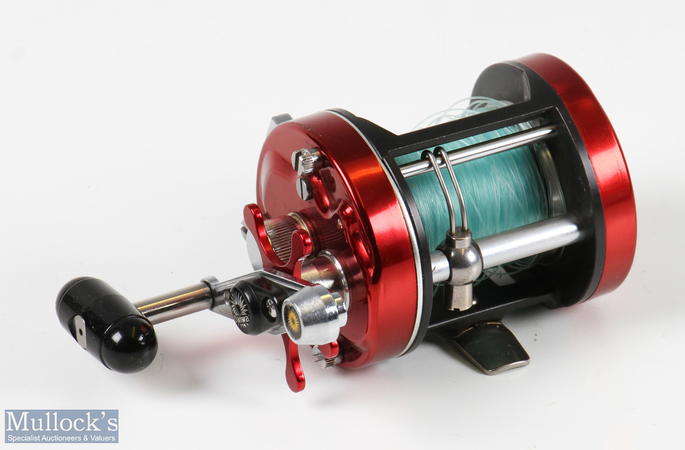 Daiwa Millionaire 6RM multiplier reel in red finish, star drag, counter balance handle, signs of - Image 2 of 3
