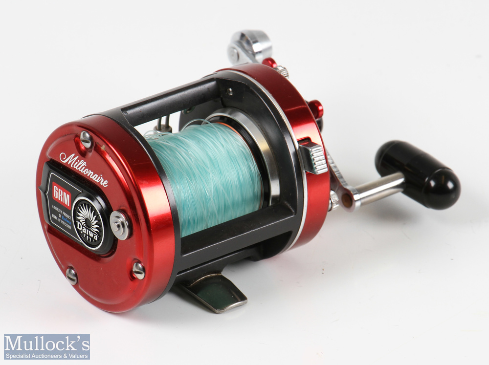 Daiwa Millionaire 6RM multiplier reel in red finish, star drag, counter balance handle, signs of - Image 3 of 3