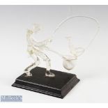 Glass Fishing Sculpture depicts fisherman landing a catch, measures 20cm height approx, on wooden