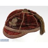 Rare and early 1870/80s England International Rugby Cap - a maroon panelled cap with braided rose