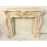 FAUX MARBLE CHIMNEY PIECE with a shaped moulded top above a central shell motif flanked by shaped
