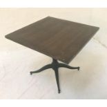 STAINED OAK SQUARE TOPPED DINING TABLE standing on a pedestal column with four outswept supports,
