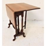 EDWARDIAN MAHOGANY SUTHERLAND TABLE with gate leg action, standing on turned supports, 70cm wide