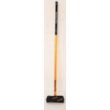 BALANCE PLUS CURLING BRUSH with a two tone handle and yellow brush head, 129cm long