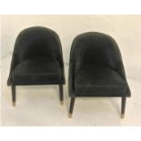 PAIR OF SLATE GREY VELVET COVERED CHAIRS with shaped arched backs above padded seats, standing on