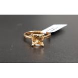 CERTIFIED IDAR GOLDEN BERYL RING the square cut beryl weighing 1.61cts, on nine carat gold shank,