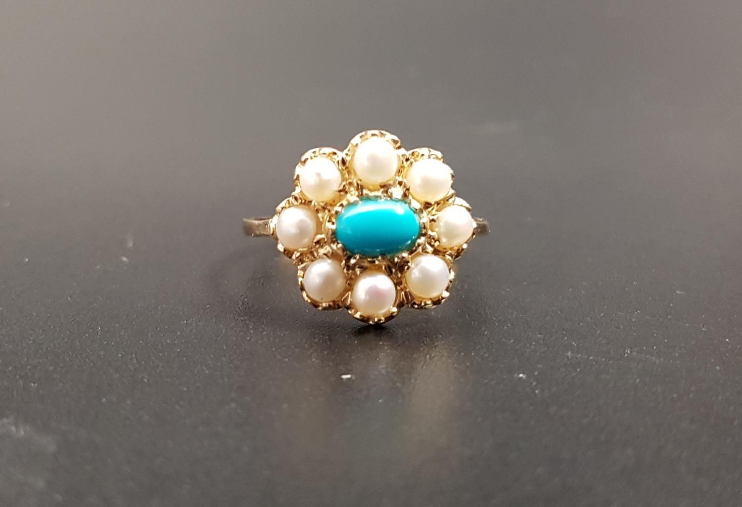 TURQUOISE AND SEED PEARL CLUSTER RING the central oval cabochon turquoise in eight pearl surround,