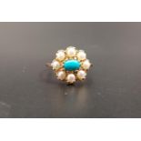TURQUOISE AND SEED PEARL CLUSTER RING the central oval cabochon turquoise in eight pearl surround,
