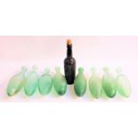 SELECTION OF EIGHT TORPEDO GLASS BOTTLES six marked J. Schweppe & Co, one marked Corroy & Co Belfast