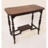 EDWARDIAN OAK OCCASIONAL TABLE with canted corners, standing on turned supports united by an