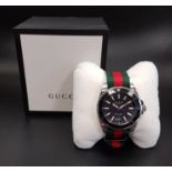 GENTLEMEN'S GUCCI DIVE CALENDAR WRISTWATCH the black dial with luminous baton five minute markers