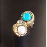 TURQUOISE AND PEARL SET UNMARKED GOLD DRESS RING the twist ring also with pave set crystal detail,