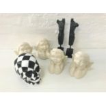SMALL LOT OF COLLCTABLE ITEMS comprising four ceramic cherub shaped vases, a black and white