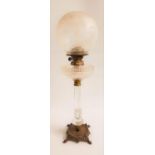 VICTORIAN OSLER CUT GLASS OIL LAMP raised on a circular metal base with four hoof feet, with a
