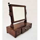 MAHOGANY BREAKFRONT DRESSING TABLE MIRROR with an oblong plated flanked by turned supports, the base