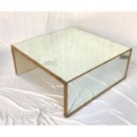 CONTEMPORARY MIRRORED OCCASIONAL TABLE with a mirrored top and side panel supports, with gilt