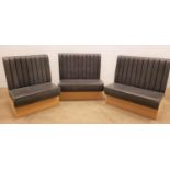 THREE STRAIGHT GREY VINYL BANQUETTE SEATS with ribbed high backs above padded seats, approximately