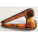 VINTAGE MEERSCHAUM PIPE with a briar bowl and amber coloured mouth piece, in a fitted leather and