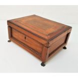 CONTINENTAL WALNUT BOX with an inlaid lift up lid above four panelled sides, standing on metal