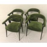 SET OF FOUR HOOP BACKED DINING CHAIRS each with padded arms, back and seat in green velvet