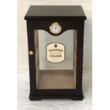MAHOGANY TABLE TOP HUMIDOR with door mounted hygrometer, and glazed front door transfer decorated,