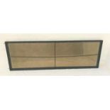 LARGE MIRRORED BACK BAR DISPLAY SECTION with a bevelled plate and in iron frame, 80cm high x 250cm