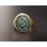 BLOODSTONE SEAL RING in unmarked high carat gold, the seal depicting the Smyth family crest with