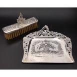 CONTINENTAL SILVER CRUMB SCOOP AND BRUSH both with profuse embossed floral and scroll decoration,