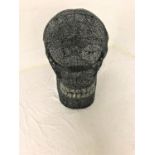 LARGE METAL FABRICATED SKULL in two sections, with pierced detail overall, made by Zarr Ltd. USA,