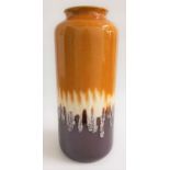 WEST GERMAN POTTERY VASE of cylindrical form and decorated with a mustard and treacle glaze, the
