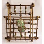 PAIR OF ARTS AND CRAFTS WINDOW INSERTS of brass tubular form with panels of iridescent motifs,