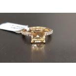 CERTIFIED GOLDEN BERYL AND WHITE ZIRCON RING the central square cut Idar Golden Beryl weighing 2.