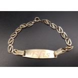 FOURTEEN CARAT GOLD IDENTITY BRACELET the central plaque engraved 'Elis', approximately 2.1 grams