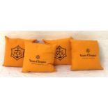 SET OF FOUR BRANDED VEUVE CLICQUOT CUSHIONS the bright orange cushions with embroidered detail to