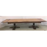 VERY LARGE OAK DRAW LEAF DINING/BOARD ROOM TABLE standing on large bulbous turned supports with four