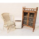 BAMBOO DISPLAY CABINET with a three quarter galleried top above a pair of glass doors, 104cm high,