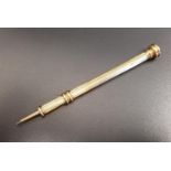 SAMPSON MORDAN & CO. GOLD PROPELLING PENCIL the ribbed body in unmarked gold, with monogram engraved