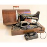 VINTAGE ELECTRIC SEWING MACHINE numbered ED174211, with a light, motor, power cable and foot