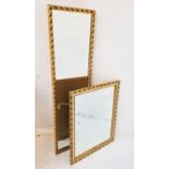 RECTANGULAR WALL MIRROR in a carved giltwood frame, 116cm high, together with a square wall