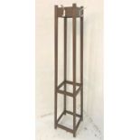 STAINED PINE COAT STAND of tapering rectangular form with a hook to each side, 173cm high