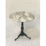 CIRCULAR BROWN VEINED MARBLE TOPPED BISTRO TABLE raised on a metal column with tripod base, 70cm